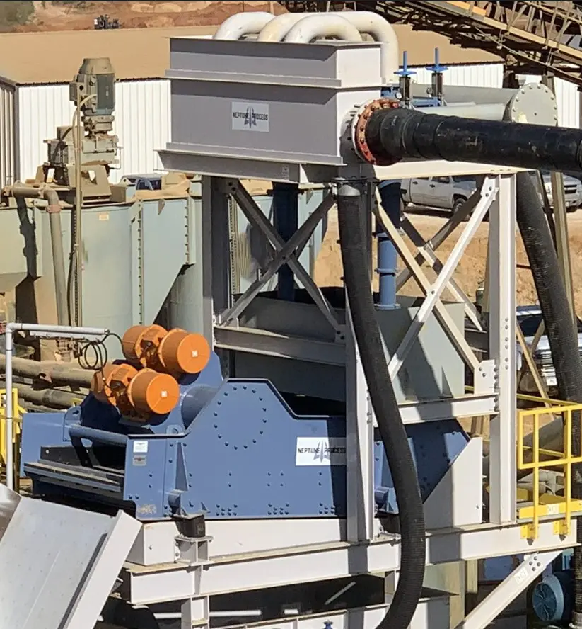 A machine that is sitting in the dirt.