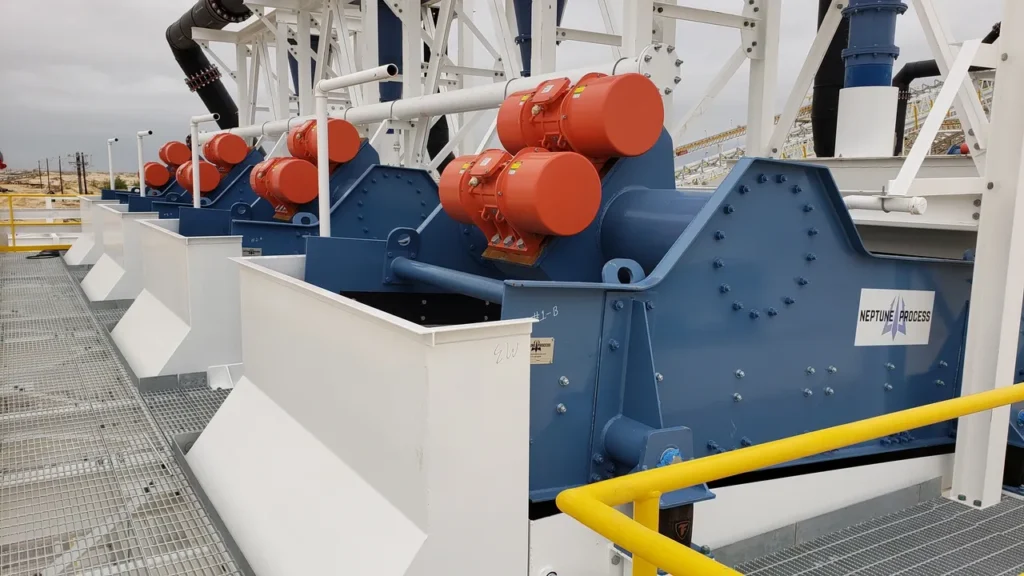 A group of large machines sitting next to each other.